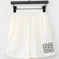 N9 Ruff Bo Embroidered V-Neck Tee Pants Set - Cream